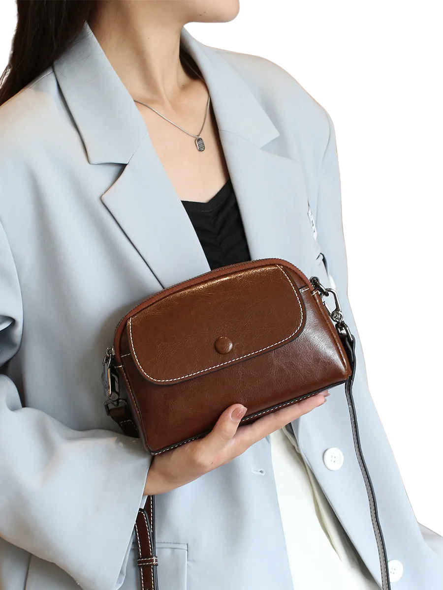 MINI BOLSA CONCIARO EM COURO LEGITIMO