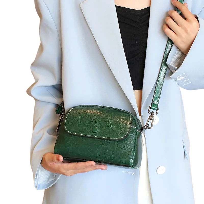 MINI BOLSA CONCIARO EM COURO LEGITIMO