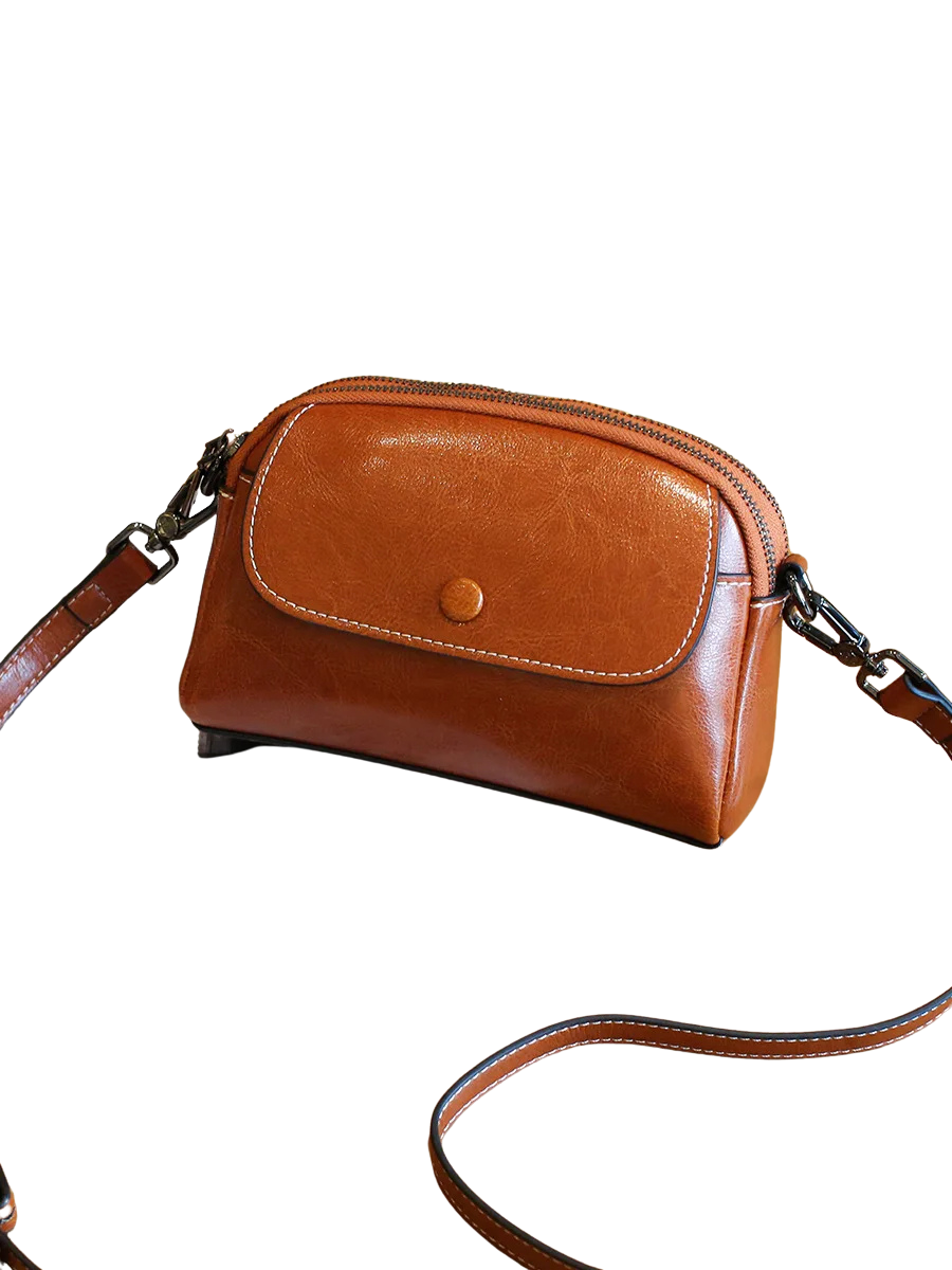 MINI BOLSA CONCIARO EM COURO LEGITIMO