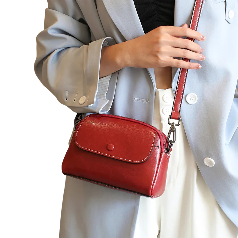 MINI BOLSA CONCIARO EM COURO LEGITIMO